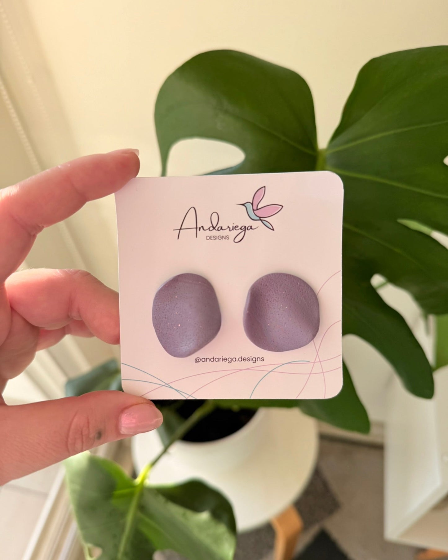 aros lourdes morados