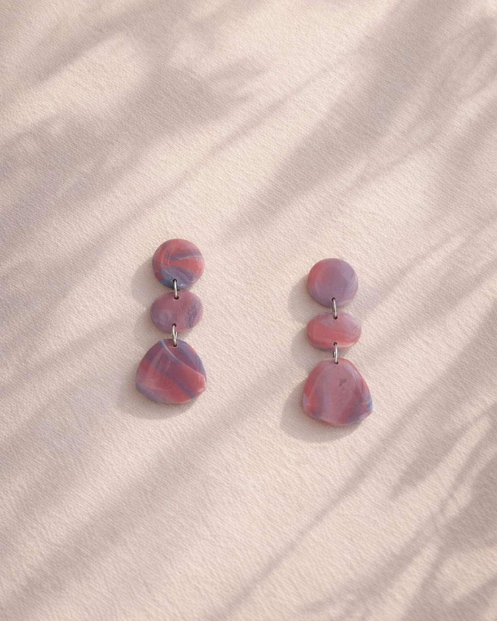 aros paris rosa y morado